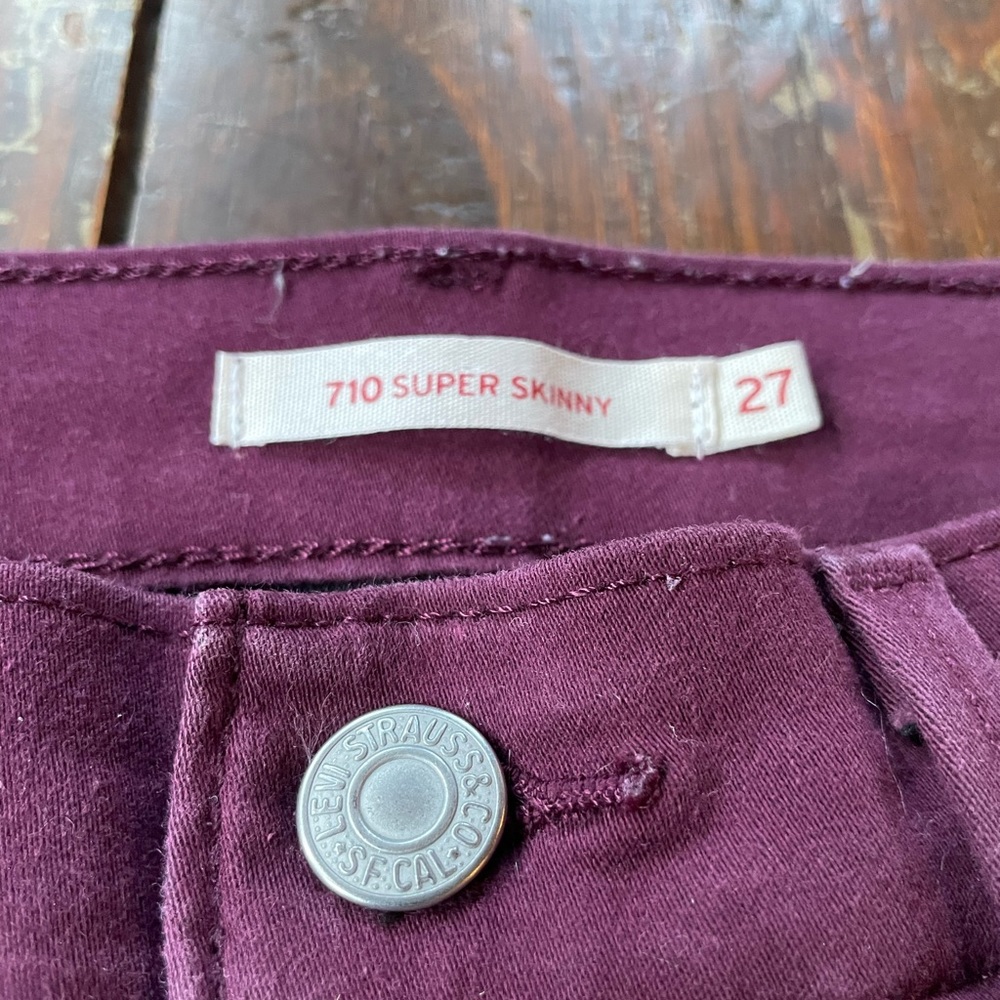 Red Levi skinny jeans